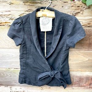 Black linen peplum style top. Size small. Cap sleeves, front tie.
